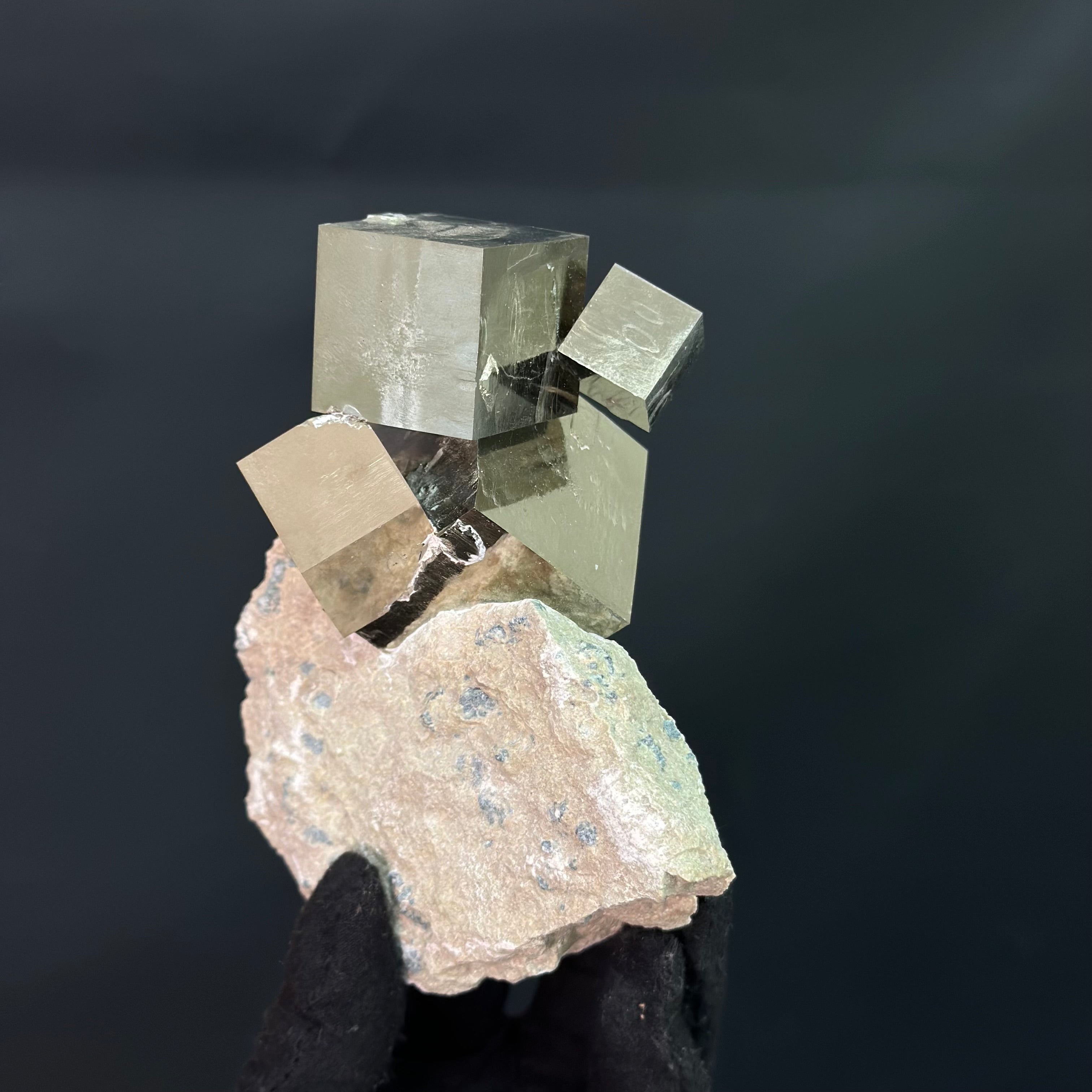 Cluster Pyrite on Matrix, 4 cube’s formation, from Mina Ampliación A Victoria, Navajún, Spain.